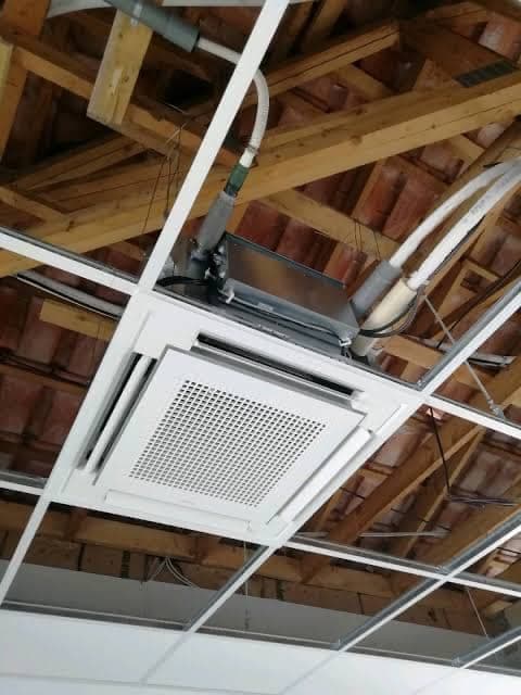 Cassette unit and ductwork fitted to a roof structure by Helmont